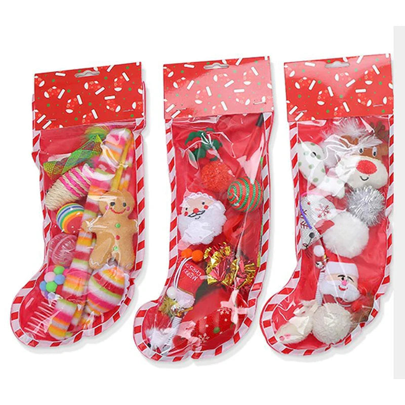 Christmas pet toys set packaged in red candy cane stockings with festive small plush and plastic cat chew toys